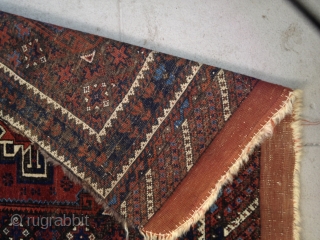 Baluch bagface with a turkoman inspired gol and charming light blue and yellow color highlights in the border.

2'10" x 2'5".             