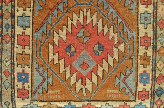 A unique Northwest Persian? Kurdish? rug with very appealing bold and archaic design elements. 4'7" x 3'2". 

               