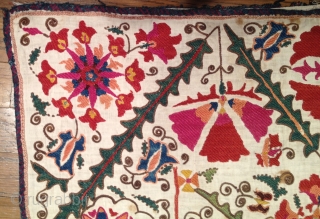 Very pretty early 19th century Suzani with wonderful colors. Has stains but in decent condition otherwise. 4'9" x 3'2'.              