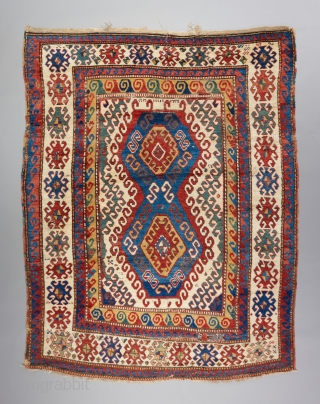 Kazak with very good age. Great bold color and design that we all love too see in this type. 7'9" x 5'3". Great pile in some places. Cut and reattached in a  ...