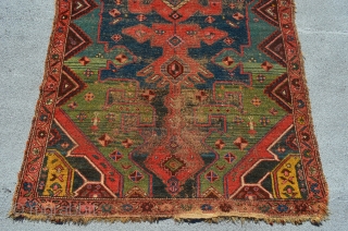 Kurdish Rug. Very Unique and bold design. The color variation simply pulls you in.
Some wear and tear but it doesn't obscure the power of the drawing. Some glue on the back. 19th  ...
