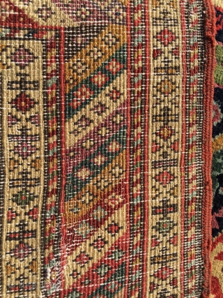 Mid 19th century northwest runner . Spectacular colors . Wool warps and cotton wefts. Cut at one end . A few small tears . App. 10' x 3'.     