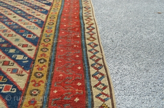 Genje. Mid 19th century or older. All original except for two small repairs on the border and sides are redone.

7'3" x 2'10"           