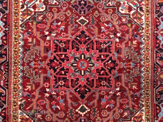 Small superb quality Heriz rug circa 1930. Size: 5'0" x 6'2". Clear jewel colors, soft glossy wool, fine weave, and a supple handle. Perfect condition with thick full pile over the entire  ...