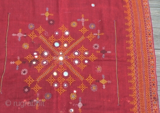 Antique Indian Embroidered Wedding Shawl or “odhni” from the Thar Desert region near Jaisalmer in Rajasthan. Approximately 78 x 48 inches. The background cloth is 2 strips of brick red handloomed wool  ...