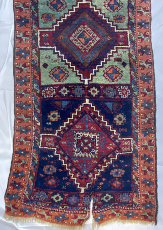 East Anatolian Kurd Yuruk Rug, Turkey, late 19th century. 2'7'' x 6'6'' (79 x 198 cm). Wool pile, wool warp, wool weft. Good pile and beautiful colors. Obvious split damage at one  ...