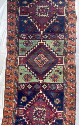 East Anatolian Kurd Yuruk Rug, Turkey, late 19th century. 2'7'' x 6'6'' (79 x 198 cm). Wool pile, wool warp, wool weft. Good pile and beautiful colors. Obvious split damage at one  ...