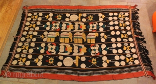 Antique Naga Man’s Shawl from Manipur region India. 72 x 48 inches. The textile is handloomed cotton with a black, red, yellow and ivory strips. The weave has a tight fine weave  ...