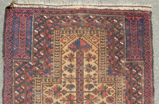 Antique Baluch Prayer Rug. 31 x 45 inches. 19th Century. See Michael Craycraft's "Belouch Prayer Rugs," plate 24 page 58 for a similar example. Low even pile and wear. See more textiles  ...