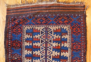 Antique Baluch Rug. 42 x 28 inches. Very good condition. Very nice popping electric blue dye. Great visual appeal. See this rug and lots of others just added at www.banjaratextiles.com   