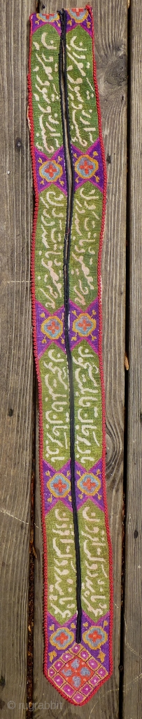 Nice old/antique Uzbek embroidery. 47 x 4.5 inches. Probably a yoke or collar.I don't know what the script says.              