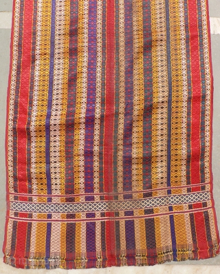 Old Indian Rajasthani Bridegroom’s Turban Length. Handloomed turban from Thar Desert region. 170 inches (14.5ft) x 21 inches. The textile has a red cotton foundation with colorful warp-face brocading to create the  ...