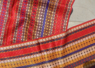 Old Indian Rajasthani Bridegroom’s Turban Length. Handloomed turban from Thar Desert region. 170 inches (14.5ft) x 21 inches. The textile has a red cotton foundation with colorful warp-face brocading to create the  ...