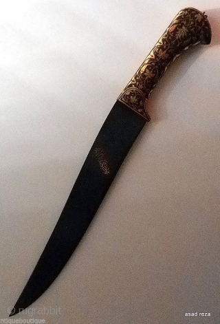 Mughal Dagger with beautiful intricately done gold floral pattern,known as Koftgari work.The length is approx. 14 inches with original blade.There seems to be a hint of some patina but not easily visible  ...