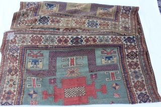  

KARACHOV KAZAK Cazcasus, 18TH  CENTURY
Wool on Wool Naturalcolor,with sigms of age and use wear 
Size: 247x148cm               