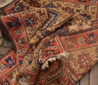 Unusual small camel ground rug, probaly Kurdish, with human figures and lots of animals, natural exceptional colours with a rare light green, good condition, sides secured, handwashed
73 x 130cm    