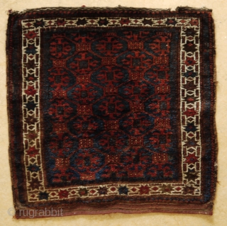 Baluch bag face with lattice design, full pile, some slight traces of use at the border, natural colours except for a few green knots. 

72 x 73 cm.     