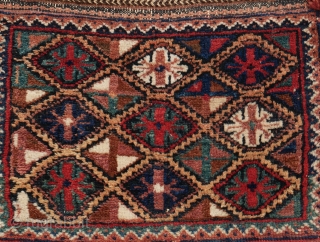 Small Afshar bag, a chanteh for personal use with snowflake motif. Good colours, with the soft orange tipfaded, good pile. 47x 36 cm. 	         