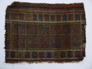 rare tribal bag face, Baluch  
deep natural colours, full pile, no repairs, a tribal conversation piece.  
64 x 48            