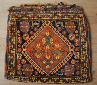 Qashqai bag, this one has it all! And something special: dated 1322 = 1904. probaly made for a special occasion or person. 
Mint condition, very nice kilim backside,natural colours, 52 x 48  ...