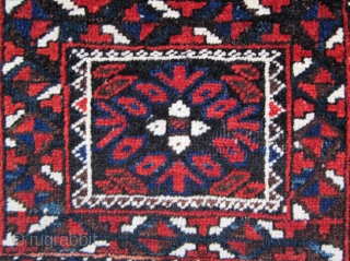 Very unusual Baluch bagface. Small format, almost like a chanteh. All good colors and very good condition. More age than may appear. I think late 19th century. The kilim design at the  ...