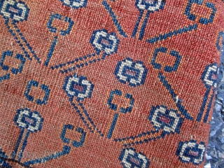 Very unusual Turkmen fragment. probably the skirt from a Tekke Engsi. The centers of most of the elements are magenta silk. One of a kind.        