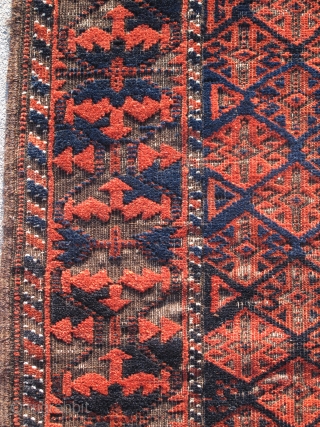 Fine Antique Baluch Rug, Great scale and drawing with several dark blues and practically sculptural corrosion to the browns. Khorosan variety an all-over repeat field derived from flatweaves and a boldly drawn  ...