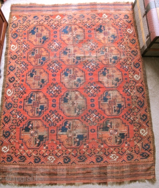 Central Asian Main Carpet with large guls. Some features resemble Turkmen weavings from the Middle Amu Darya region but the construction of this piece, including one strand per pass wefting, is unlike  ...