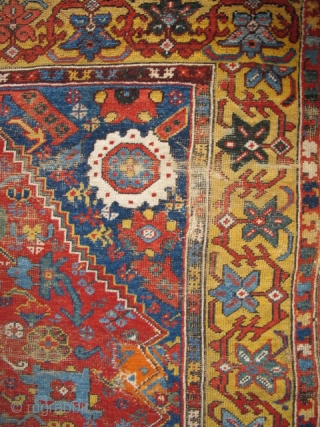 Kula type rug, (or at least it appears so at first glance) Intensely saturated colors including two yellows, at least three blues and four greens. Lots of lazy lines. The border is  ...