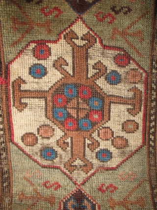 East Anatolian Rug with Transylvanian Border. Great graphics, 3 medallions nicely drawn with an assortment of scorpions. Good colors with an unusual subdued palette. Condition is fair with scattered old "repair" and  ...