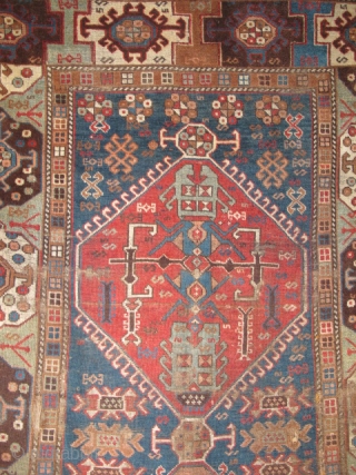 East Anatolian Rug with Transylvanian Border. Great graphics, 3 medallions nicely drawn with an assortment of scorpions. Good colors with an unusual subdued palette. Condition is fair with scattered old "repair" and  ...