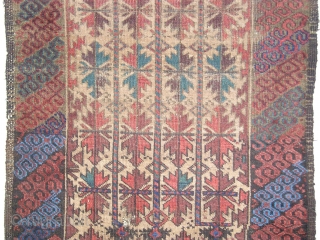 Camel-Ground Baluch rug . Perhaps Bahluli according to recent research. (see the current issue of Hali) Colorful latch-hook border (interestingly, there are no minor borders) and a great rendition of the classic  ...