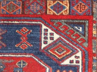 East Anatolian rug fragment, very fine weave and saturated natural color. An exceptionally elegant but battered older example of an iconic type.           