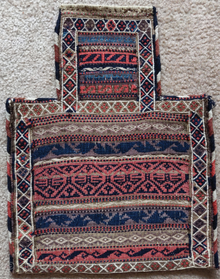 Multi flatweave technique complete Baluch salt bag. Uncommon leaf design sometimes found on Baluch pile ghurbaghe rugs, beautiful colorful striped back.            