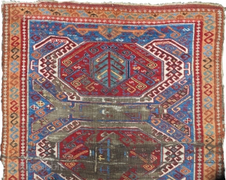 East Anatolian Kurdish long rug with a Caucasian Lenkoran design.  Vibrant color,  exceptional wool, worn. 3 different main border types.           