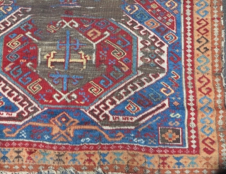 East Anatolian Kurdish long rug with a Caucasian Lenkoran design.  Vibrant color,  exceptional wool, worn. 3 different main border types.           