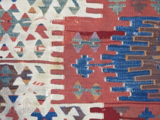 Central Anatolian kilim fragment. long strip with great colors on a white ground. Mounted and conserved.                 