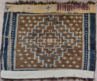 Tibetan square with a diamond design, 19th century, tie-dyed textile strip sewn onto back                   