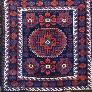 Complete Baluch khorjin with a very unusual design integrating minakhani flowers with a central Memling medallion. All good colors and in good condition. Probably Torbat-i Jam, circa 1880.  Very rare and  ...
