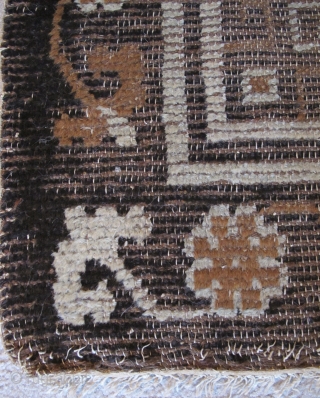 Mongolian Rug, Camel and Dark Brown un-dyed animal wool on a very light blue ground. (There is no white.) Warp is very thin reminiscent of imperial Ming carpets.) Wefting is thick brown  ...