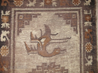 Mongolian Rug, Camel and Dark Brown un-dyed animal wool on a very light blue ground. (There is no white.) Warp is very thin reminiscent of imperial Ming carpets.) Wefting is thick brown  ...