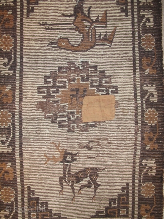 Mongolian Rug, Camel and Dark Brown un-dyed animal wool on a very light blue ground. (There is no white.) Warp is very thin reminiscent of imperial Ming carpets.) Wefting is thick brown  ...