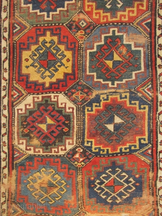 Northwest Persian Kurdish rug with a star border  and 'Memling gul'design                     