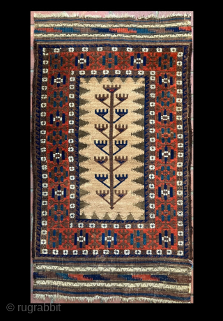 Elegant small Baluch sofreh with an abstract tree floating against a camel ground. Great color and graphic cohesion. Wonderful use of all three secondary colors, Aubergine purple, turquoise green, and madder orange.  ...