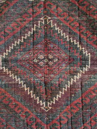 Baluch Sistan bag face with a Mushwani design. Full pile with sumak and kilim at the bottom end. Highlights in the center with an unusual light green/blue cotton? and cochineal. Former James  ...