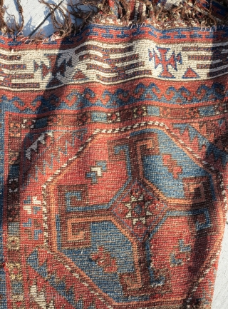 Very Old Central Asian / Uzbek main carpet with crosses in octagons. Great diverse color and an amazing border of a type I have never seen anywhere else. The negative space forms  ...
