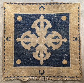 Large (over 3 feet) double dorje seating square. 18th century, perhaps Ningxia or another Chinese weaving center made for the Tibetan market. Small but obvious areas of antique repair. Very impressive presence ...