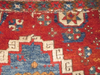 Yastik-shaped East Anatolian pastiche nicely assembled from what must have been a great East Anatolian Sivas? rug. Thick pile, good colors, could use a wash. 33"x22"       