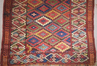 Remarkable colorful Sauj Bolagh Kurdish long rug with a step diamond field and fascinating border
                  