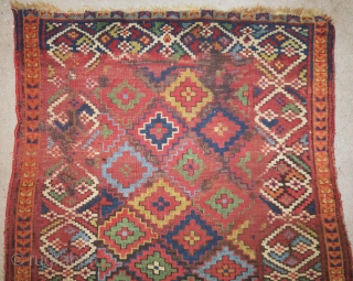 Remarkable colorful Sauj Bolagh Kurdish long rug with a step diamond field and fascinating border
                  